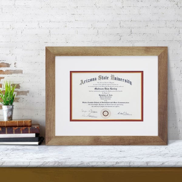 Custom framed ASU diploma framed in rustic light walnut frame and matted in cream, red, and gold matting Hall of Frames Arizona