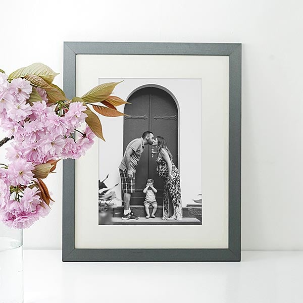 custom framed black and white photo of family framed in a charcoal gray frame and white mat Hall of Frames Arizona