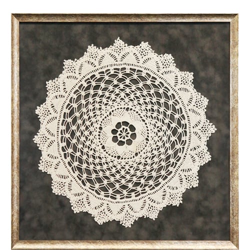 Custom framed round doily framed in antique silver frame and gray suede mat Hall of Frames Arizona