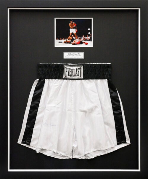 Custom Framed Mohammed Ali boxing shorts and photo framed in black shadowbox frame and black mat Hall of Frames Arizona