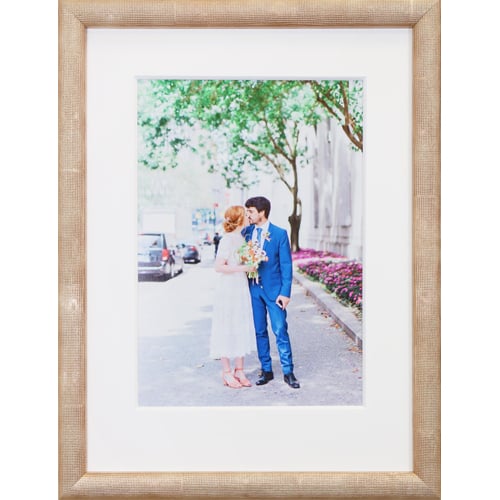 Custom framed wedding photo framed in modern rose gold textured Roma Moulding frame and white mat Hall of Frames Arizona
