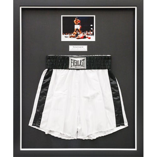 Custom framed Mohammed Ali boxing shorts and photo framed in black shadowbox frame and black mat Hall of Frames Arizona