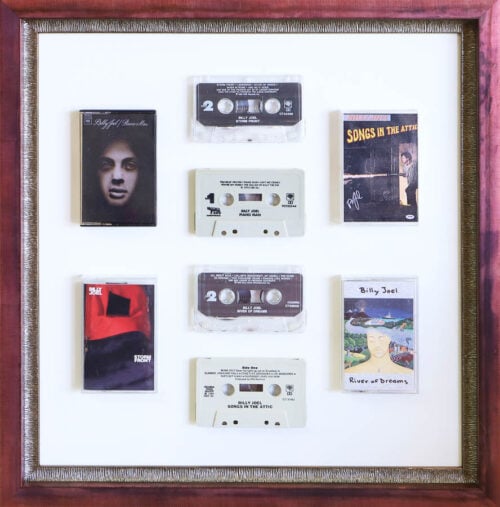 A photo of a framed cassette tapes Hall of Frames 
