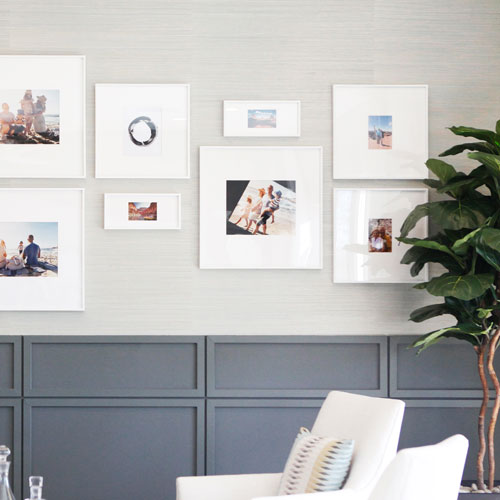 White wood frame arrangement hanging on a wall