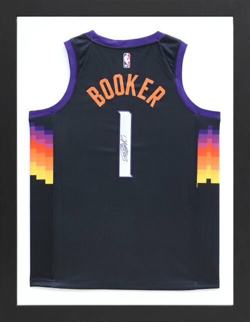 A photo of a custom framed Booker jersey from Hall of Frames Arizona.
