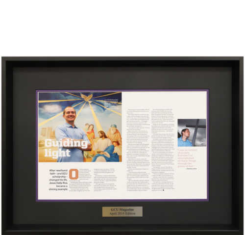 A photo of a custom framed magazine spread by Hall of Frames 