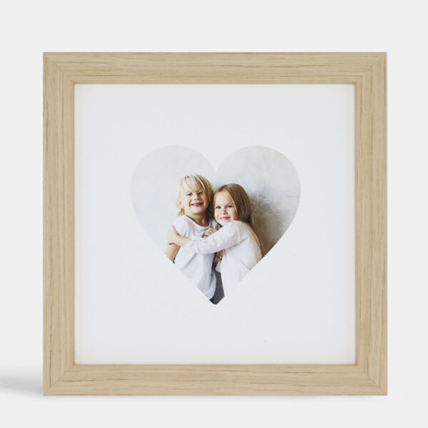 A photo of custom framed heart image in our Payson frame by Hall of Frames