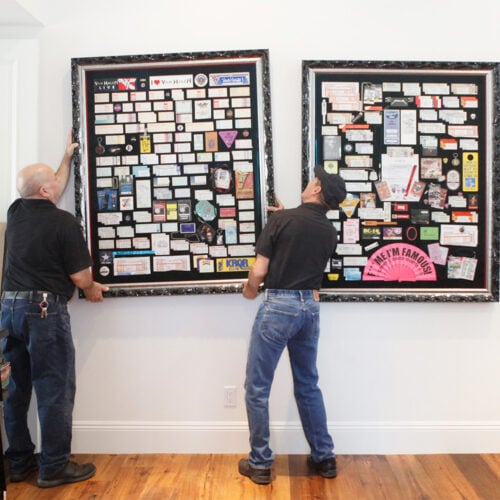 Photo of Hall of Frames installation professionals hanging large art