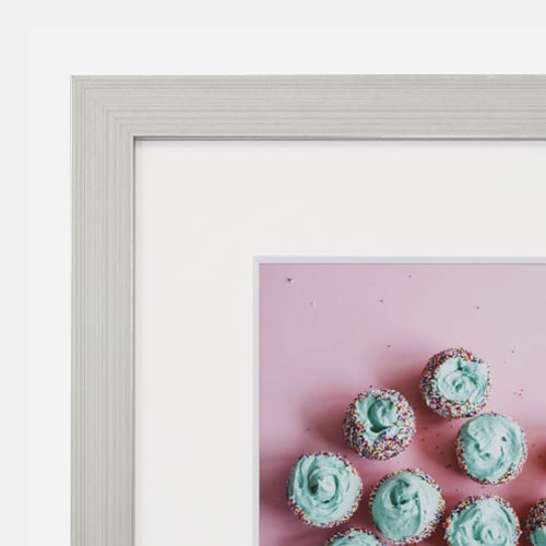 A closeup image of our upload and print custom Florence frame from Hall of Frames