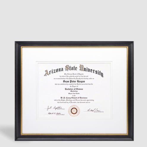 A photo of custom framed diploma from Hall of Frames