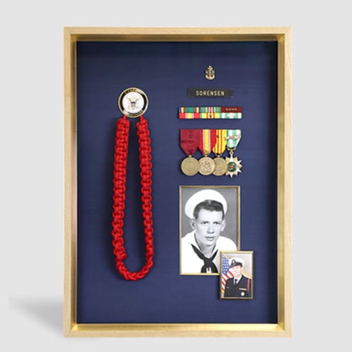 A photo of custom framed military memorabilia by  Hall of Frames