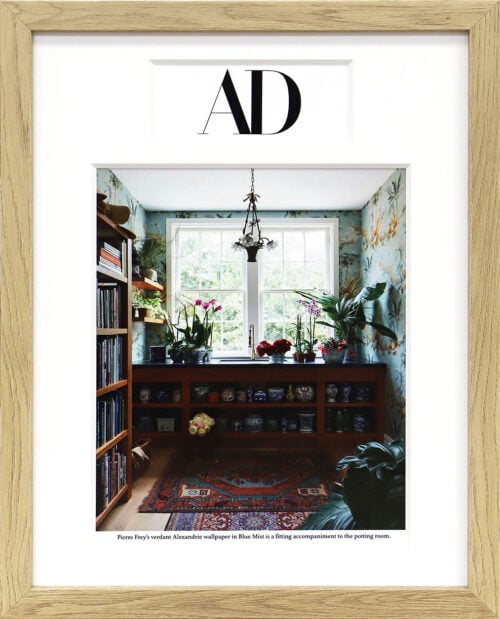 A photo of a Architectural Digest article framed by Hall of Frames.