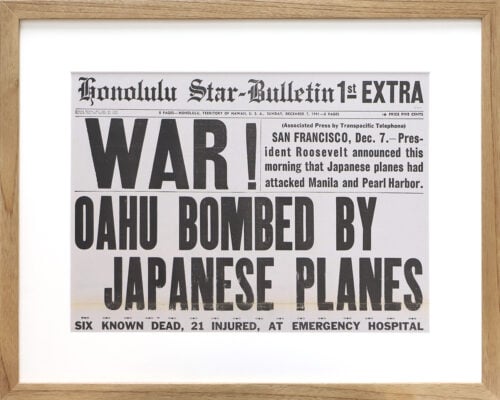 A photo of a custom framed newspaper article about Pearl Harbor from Hall of Frames.