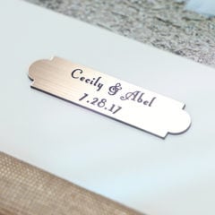 A photo of a custom engraved plate by Hall of Frames 