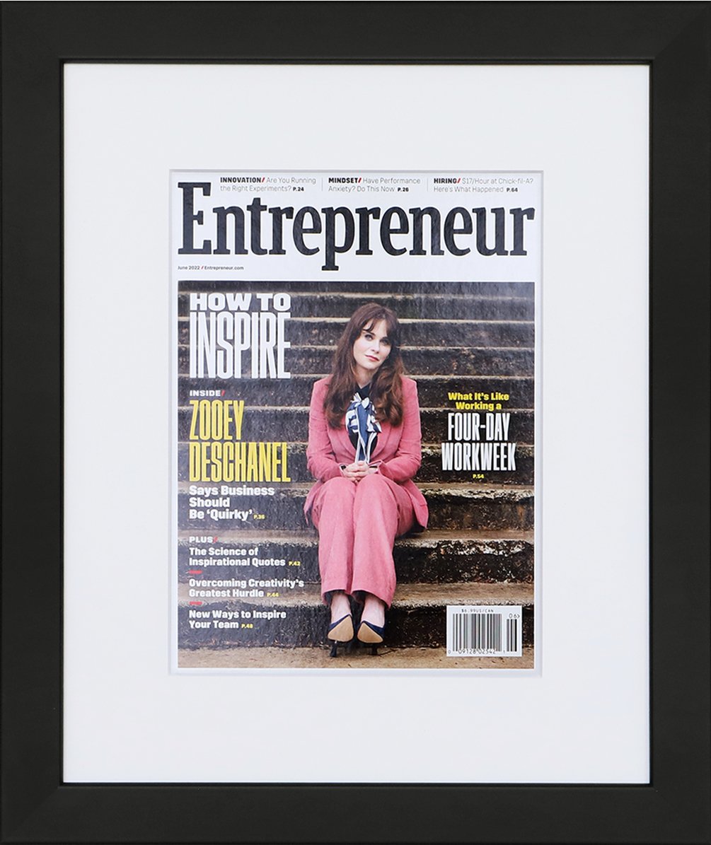 A photo of a custom framed cover of Entrepreneur magazine by Hall of Frames.