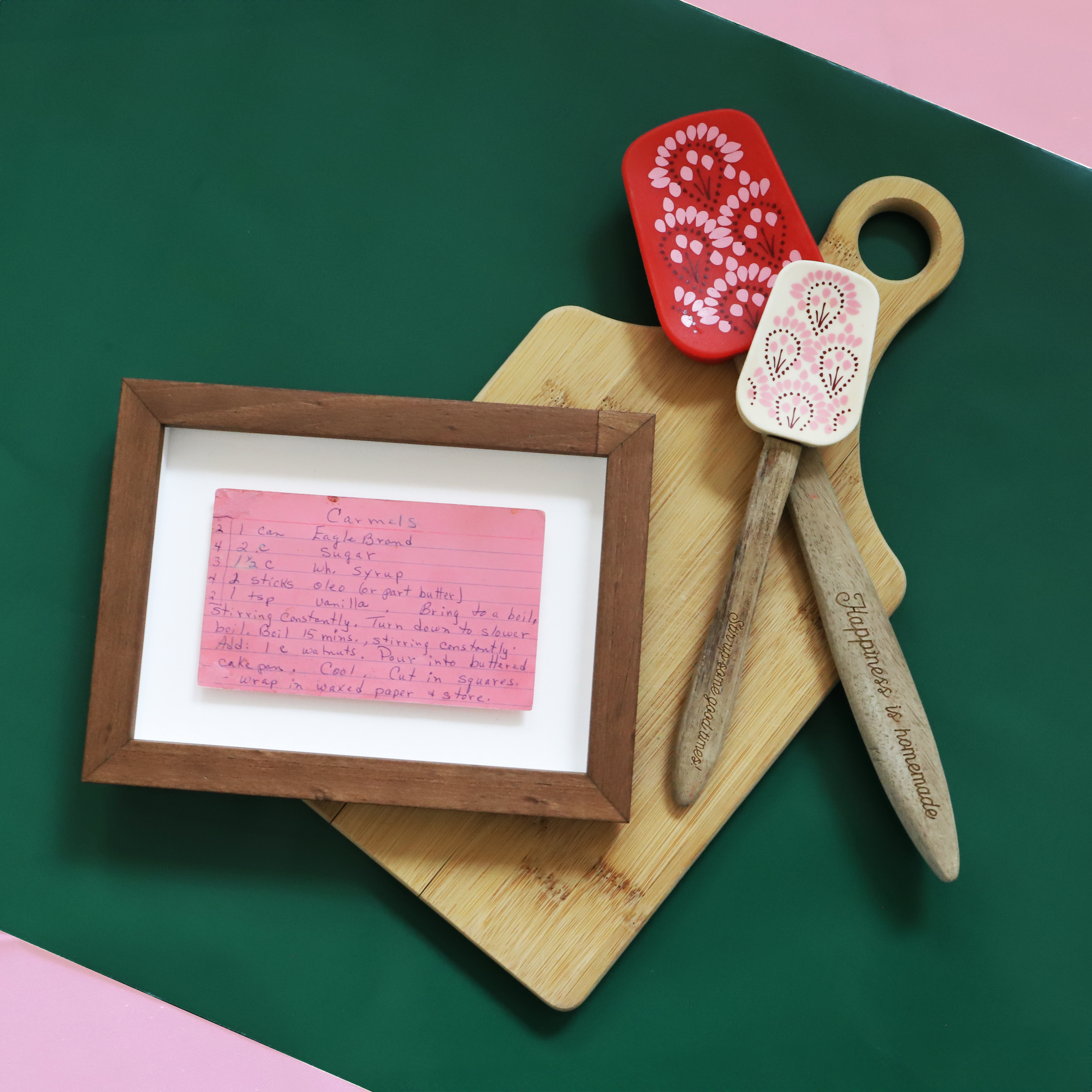 Custom Framed Family Recipe laying on cutting board with kitchen utensils