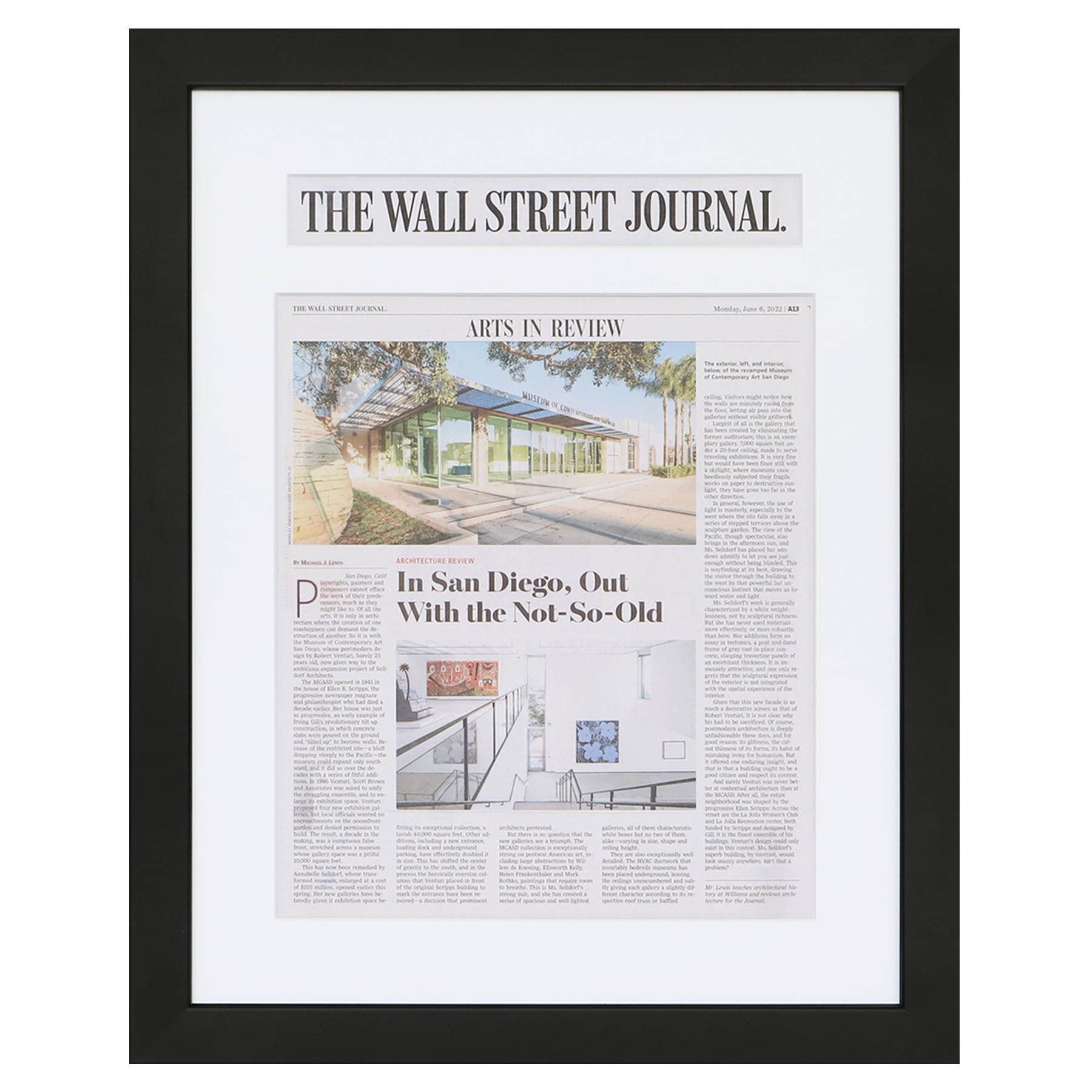 A photo of a custom framed newspaper article from Hall of Frames.
