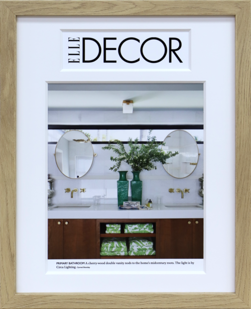 A photo of a custom framed Elle Decor magazine cover by Hall of Frames