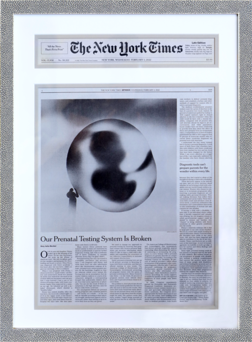 A photo of a custom framed online New York Times article by Hall of Frames