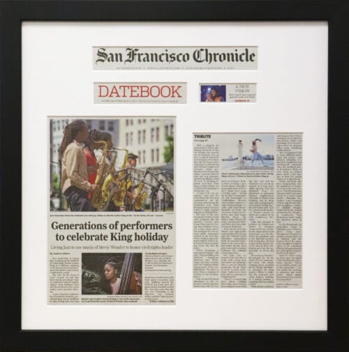 A photo of a custom framed online San Francisco Chronicle article by Hall of Frames