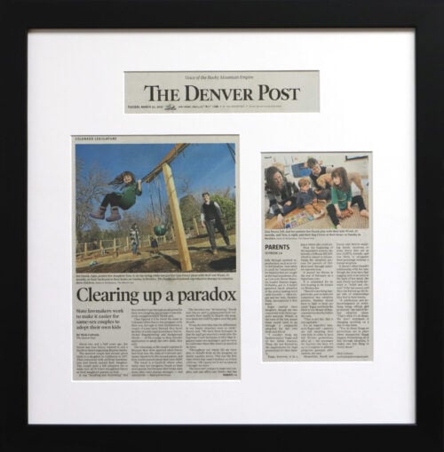 A photo of a custom framed Denver Post article by Hall of Frames