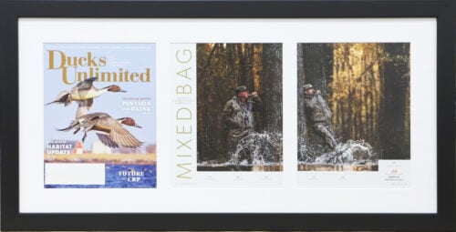 A photo of a three page Ducks Unlimited framed magazine article by Hall of Frames