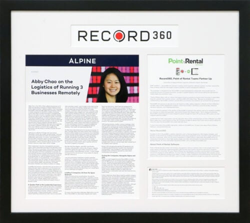 A phot of a custom framed Record 360 online article framed with a headline cutout by Hall of Frames