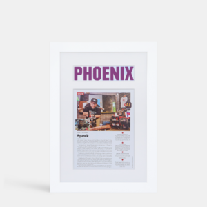 A photo of a framed magazine cover with a title headline cutout from Hall of Frames Arizona.