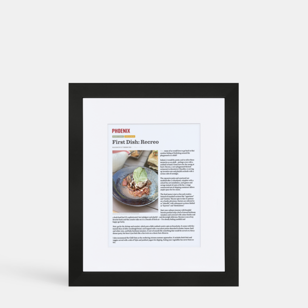 A photo of a custom framed digital article by Hall of Frames.