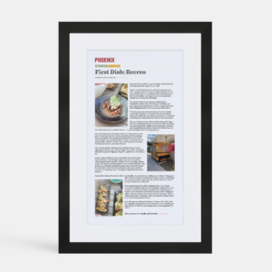 A photo of a custom framed large digital article by Hall of Frames.