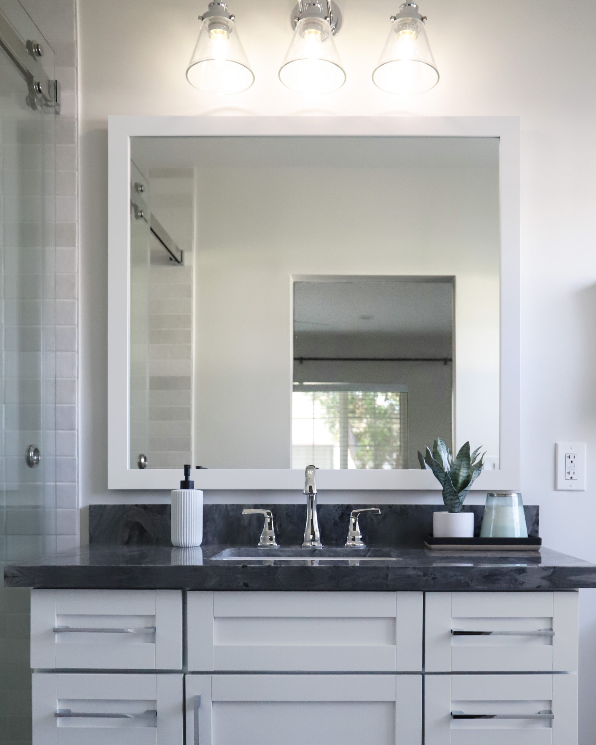White Framed Mirror over Vanity