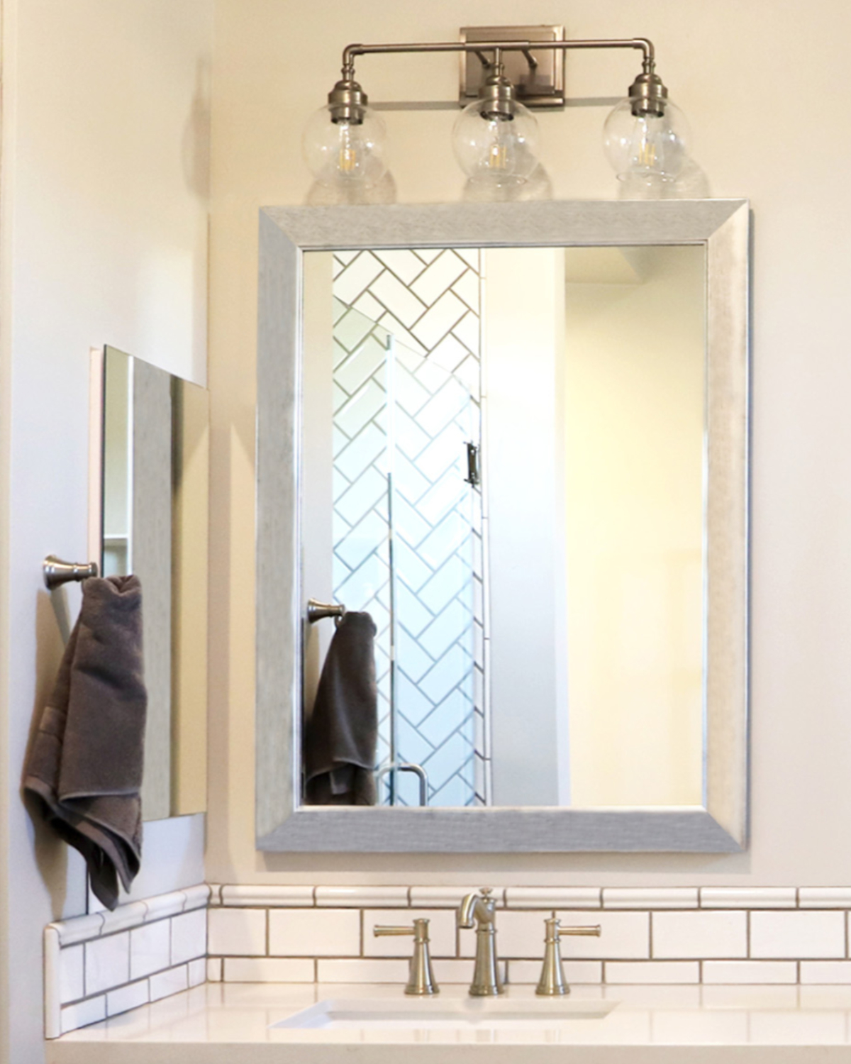 Silver Framed Mirror over Vanity