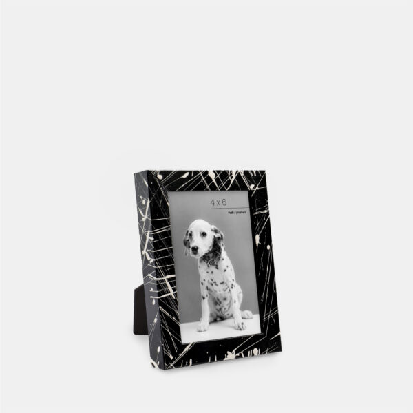 A paint splatter frame in the color Night Hush featuring a photo of a Dalmatian puppy. 