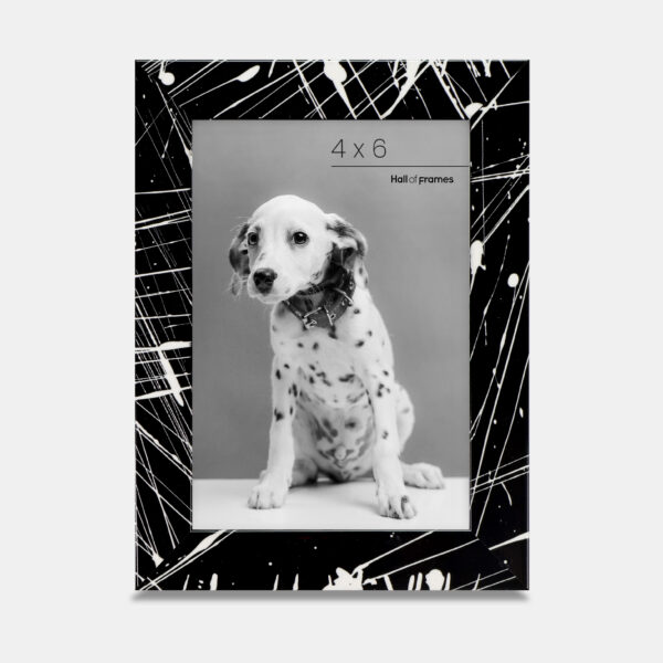 A paint splatter frame in the color Night Hush featuring a photo of a Dalmatian puppy. 
