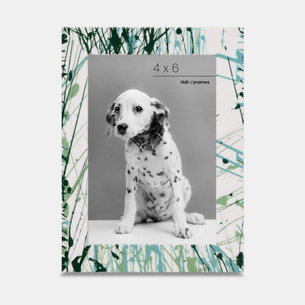 A paint splatter frame in the color Verde Mint featuring a photo of a Dalmatian puppy. 