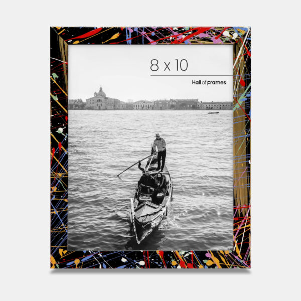 A paint splatter frame in the color Acro Mist featuring a photo of a couple in a gondola. 