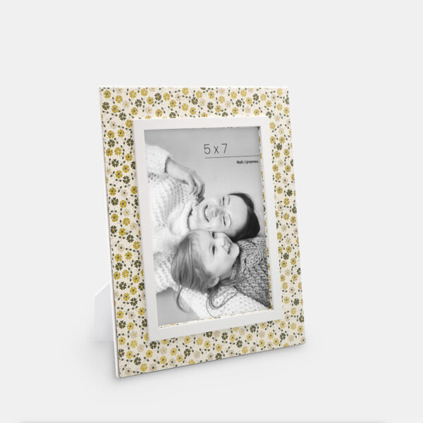 A 5x7 Italian wooden frame featuring Flowers along the edges with a photo of a mother and daughter in the center.
