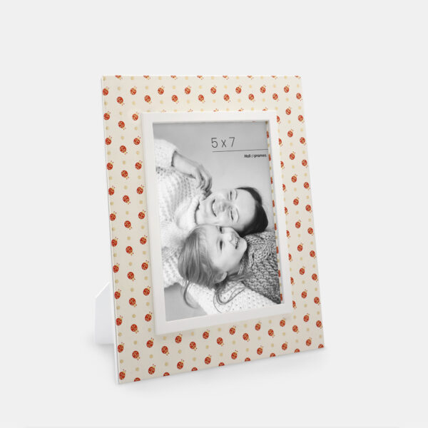 A 5x7 Italian wooden frame featuring Lady Bugs along the edges with a photo of a mother and daughter in the center.