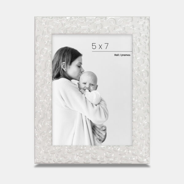 A white frame featuring ribbons of strength serving a heartfelt tribute of love and support, bordering a photo with a mother and baby.