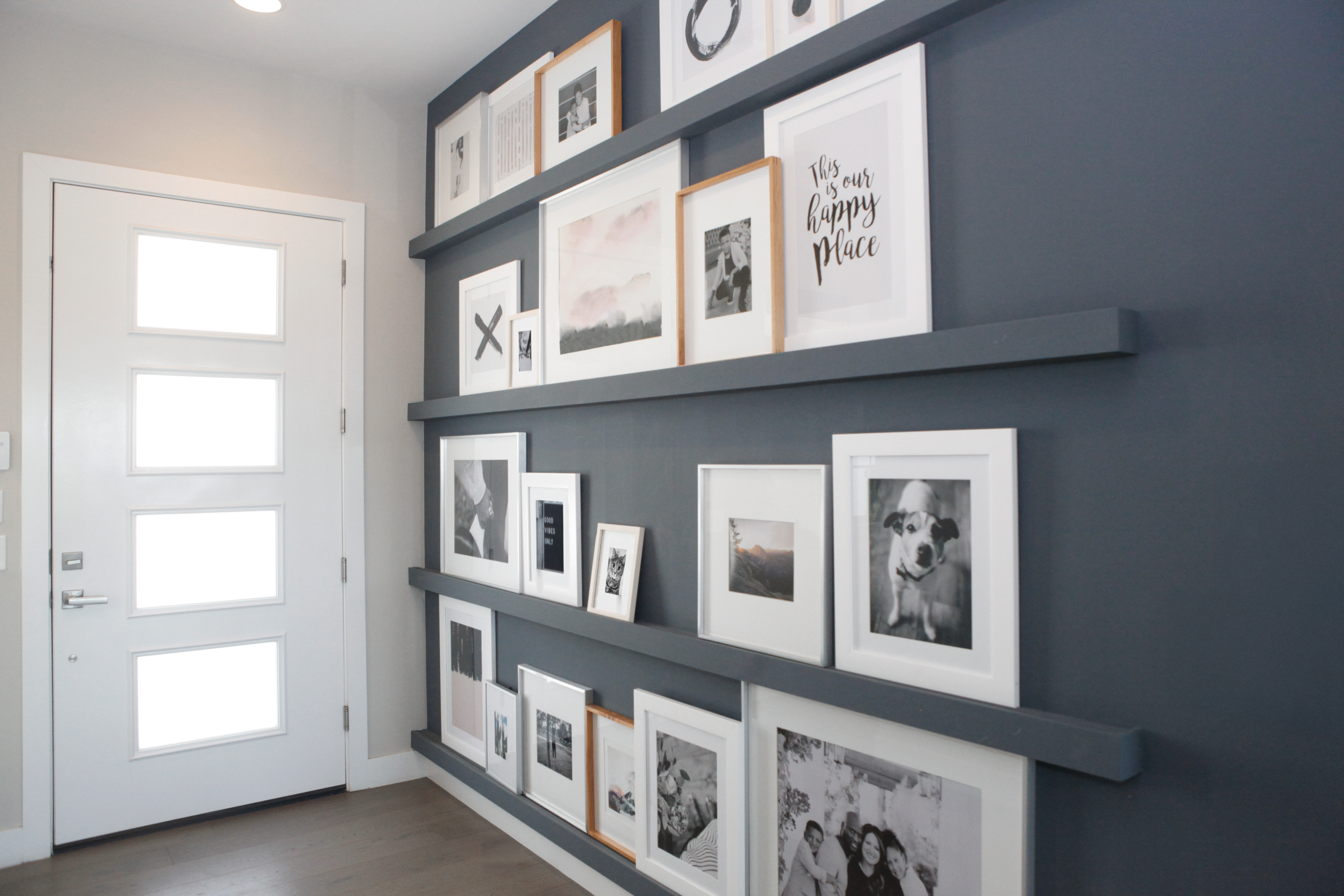 Gallery wall scene filled with picture frames
