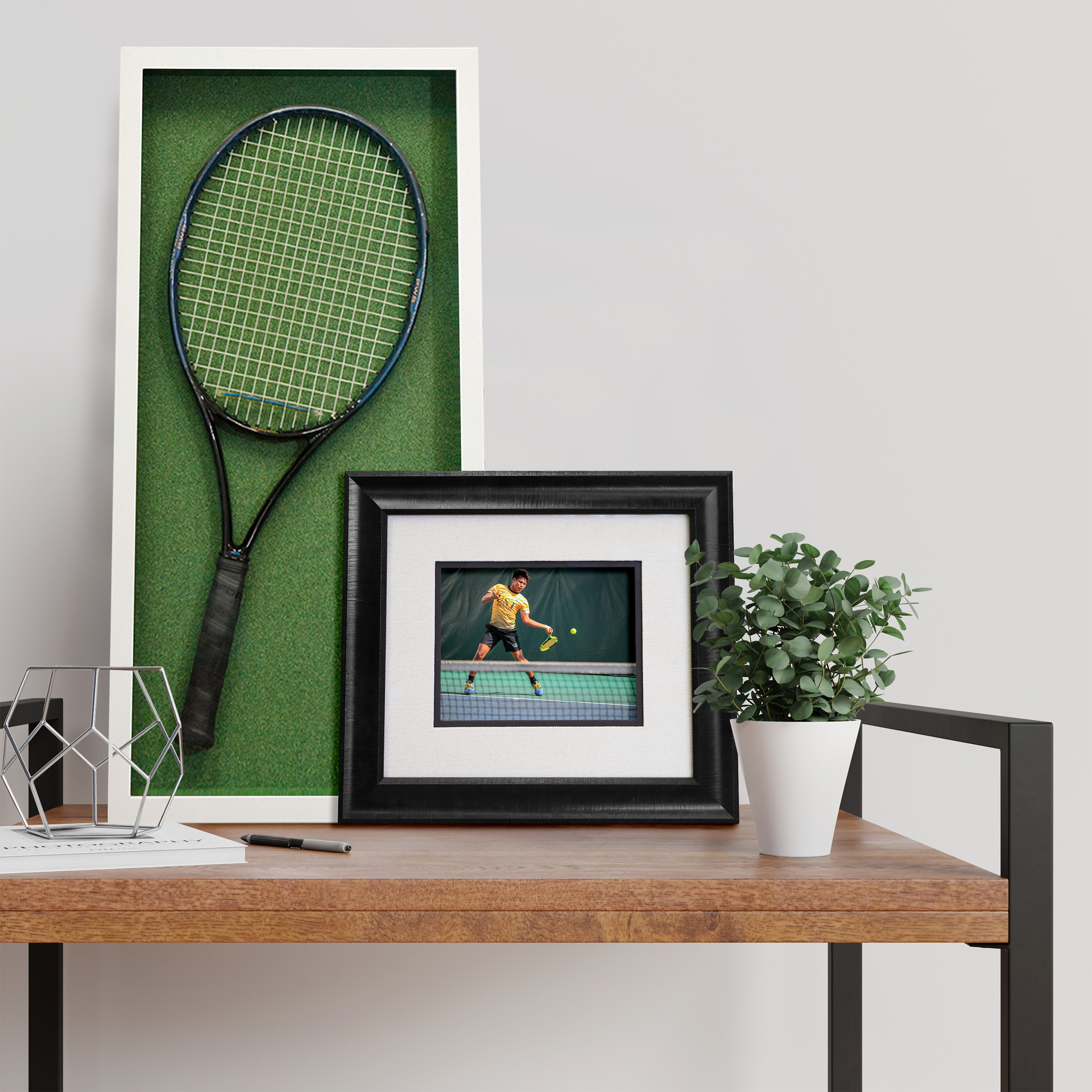 interior design scene with tennis racket in a frame with a tabletop frame