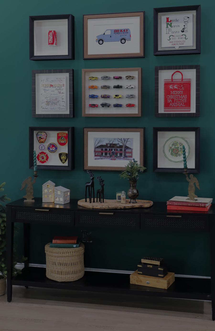 Scene of Gallery Wall featuring Home Alone Movie themed frames for holiday season