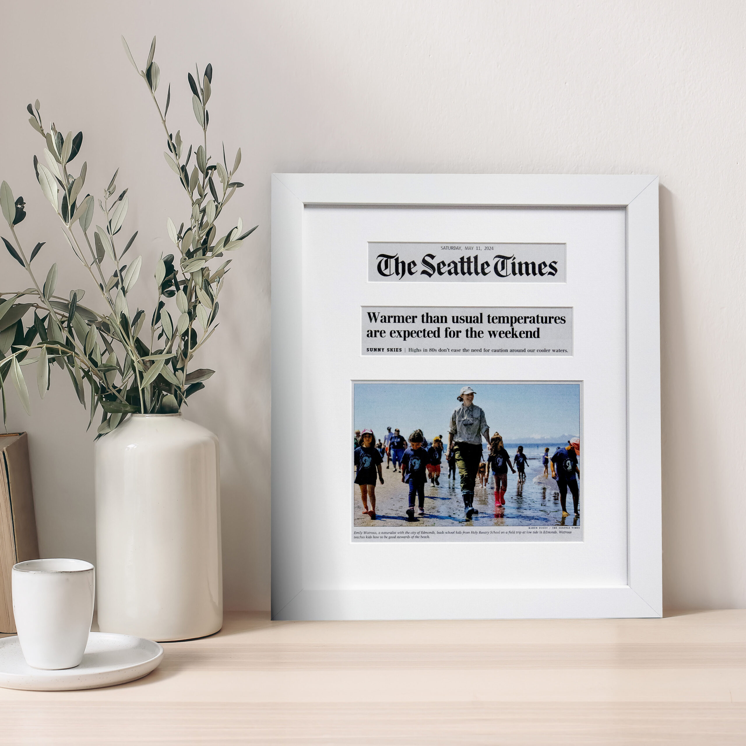 scene of a framed online article on display in a modern rustic setting