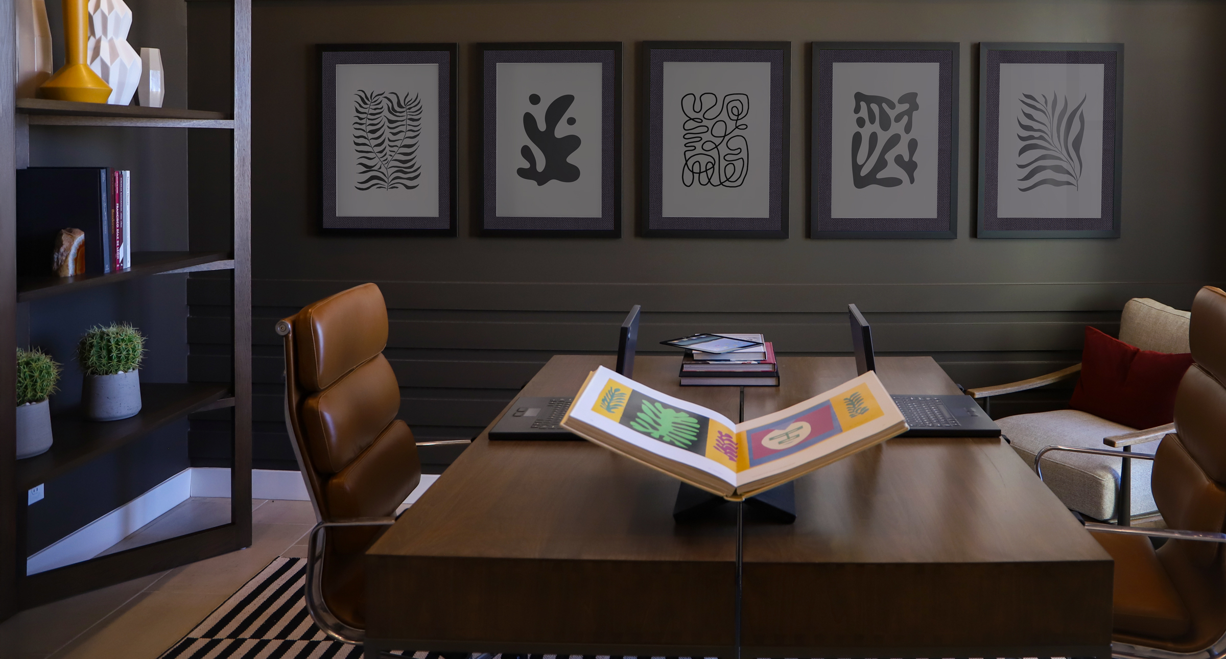 scene of framed prints in an office