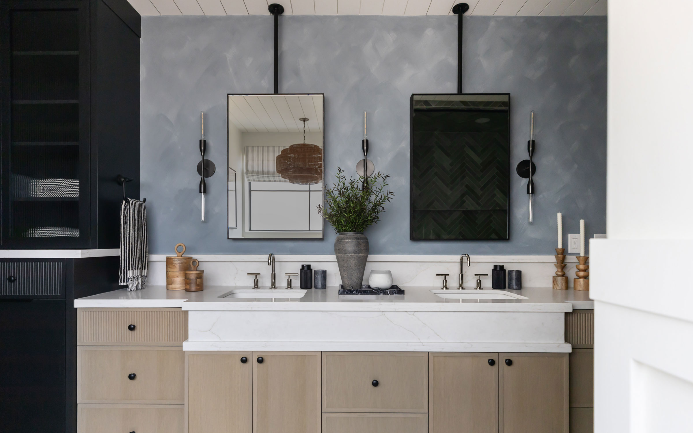 Framed Mirrors in a modern bathroom scene featuring double black infinity mirrors