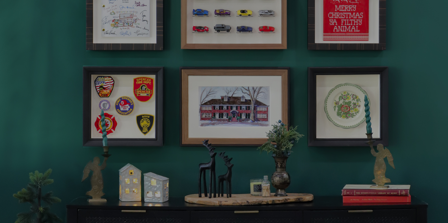 Scene of Gallery Wall featuring Home Alone Movie themed frames for holiday season