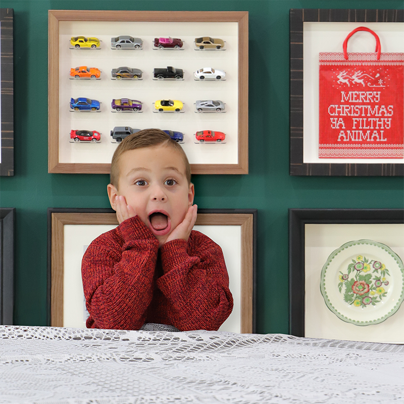 Child in front of home alone scene to reference home alone movie expression