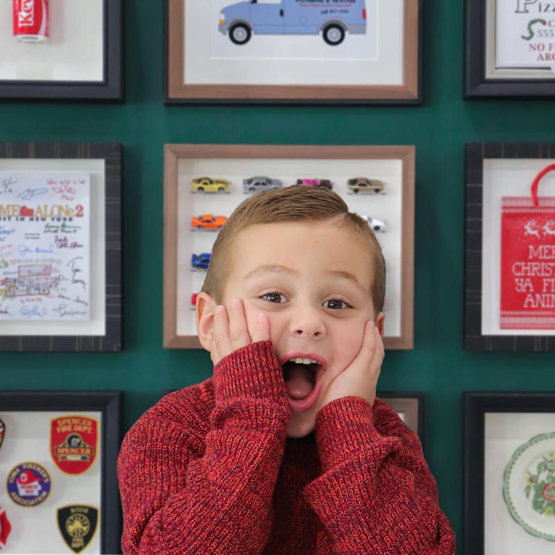 Child in front of home alone scene to reference home alone movie expression