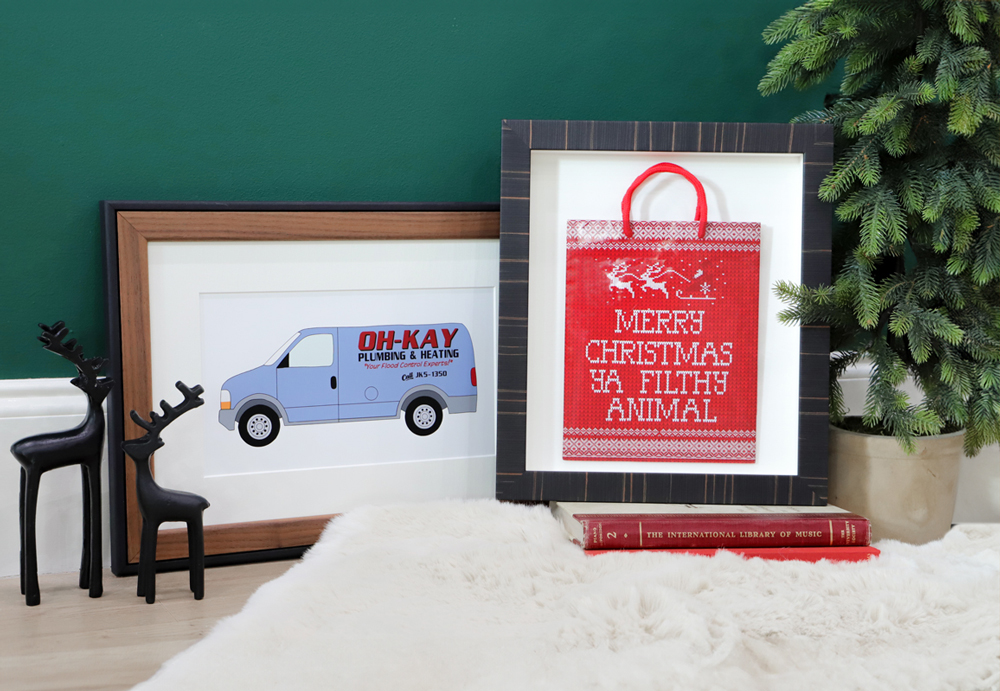 Christmas Scene of Framed gift bag and framed print playing to Home Alone Movie reference