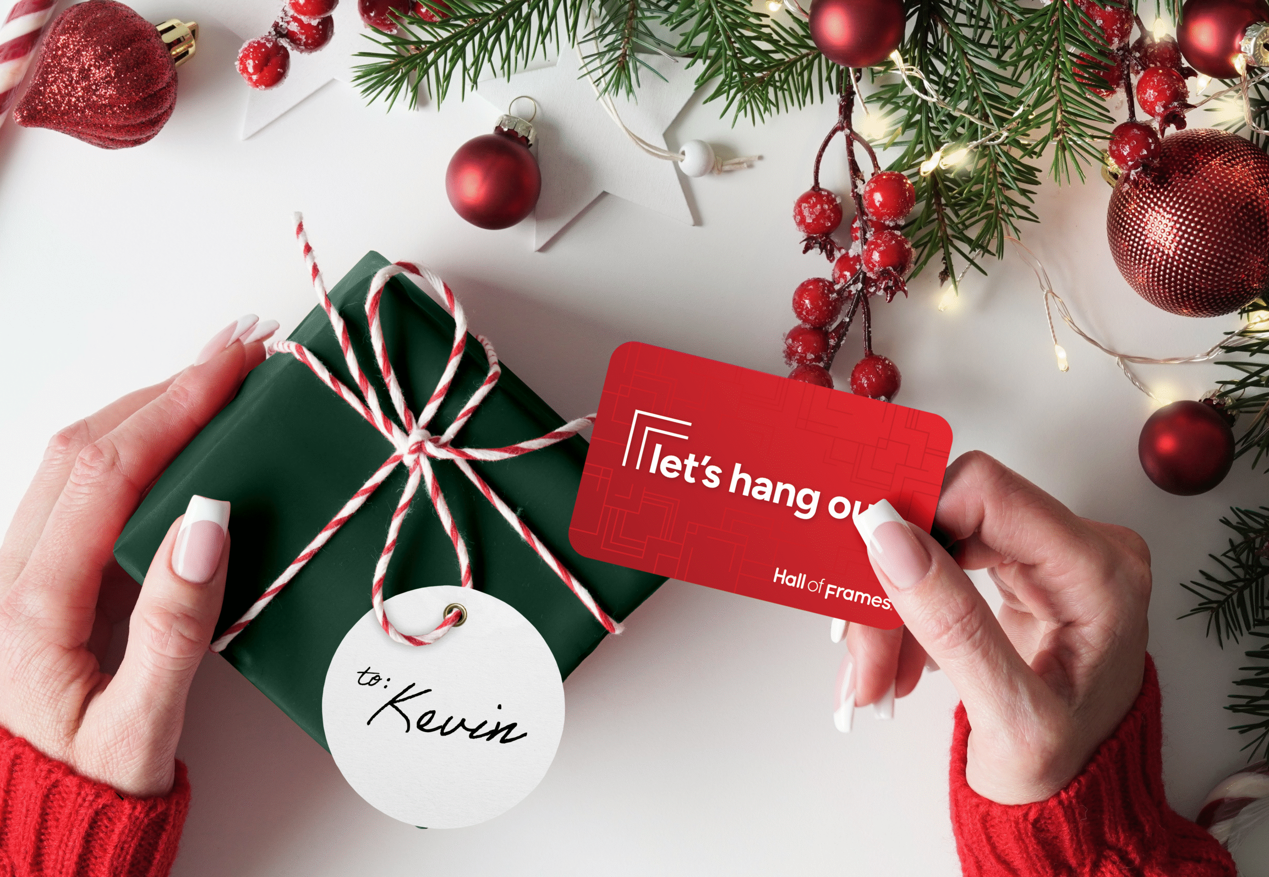 Gift Card held in front of christmas themed scene